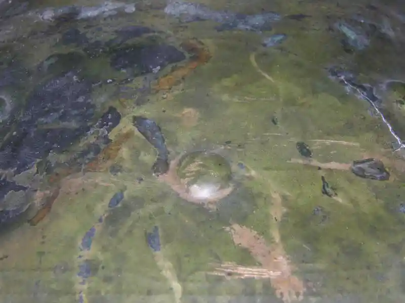 Solar disc on a metal sheet